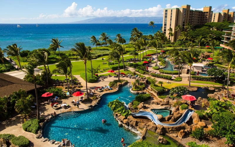 Tropical paradise with pools, slides, and breathtaking ocean views.