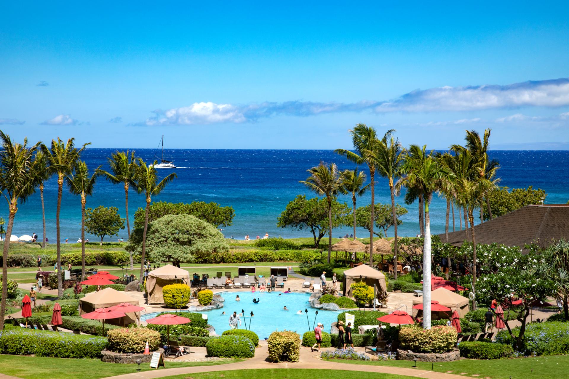 Relaxing by the pool with ocean breeze and sunshine bliss.
