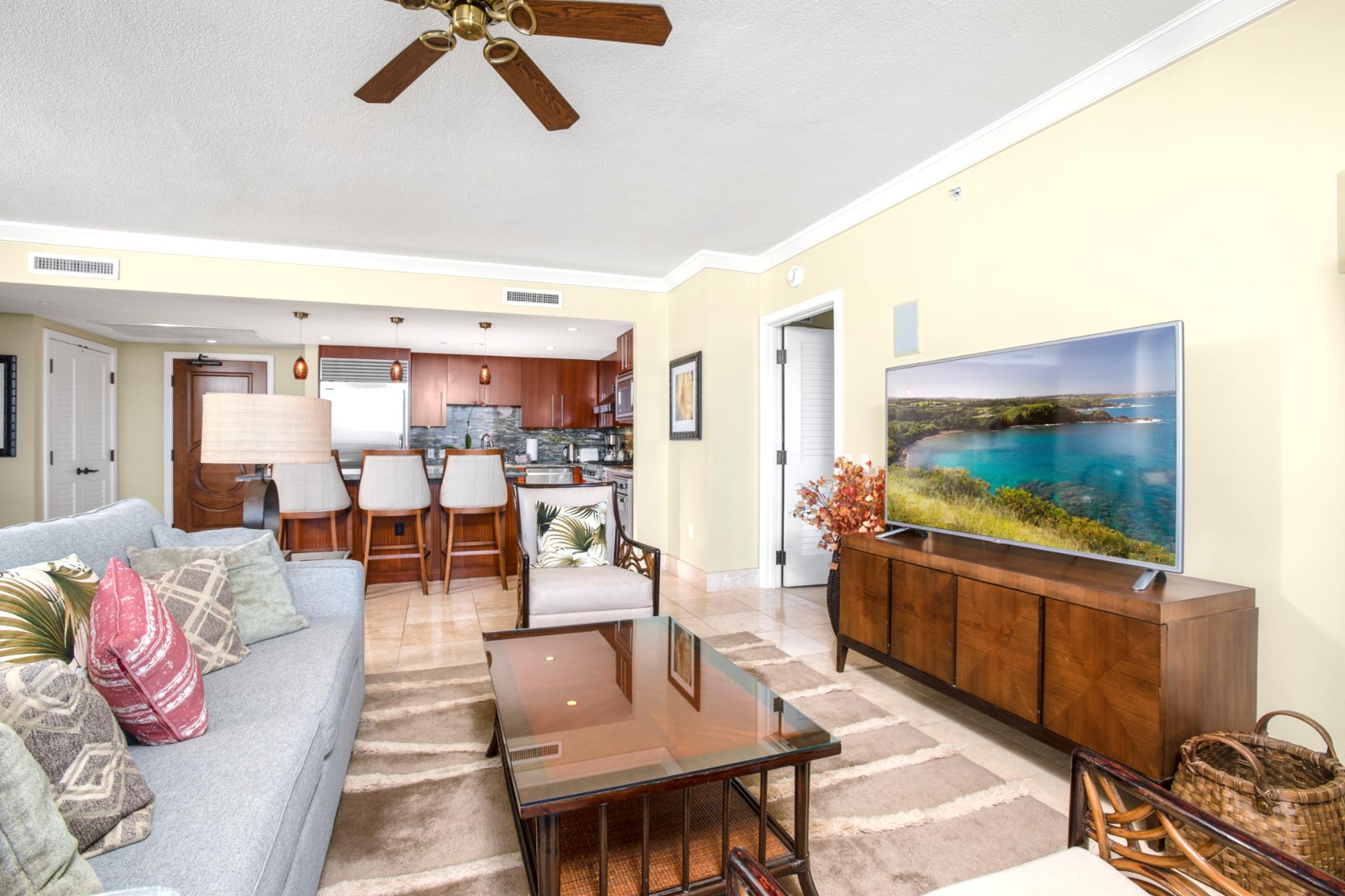 Whether you're hosting a dinner or lounging in style, this bright and breezy living area offers unbeatable comfort 