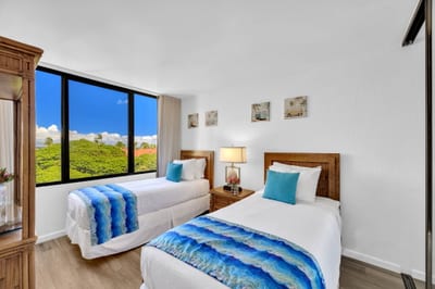 The comfortable twin beds are perfect for children or guests with vibrant coastal energy