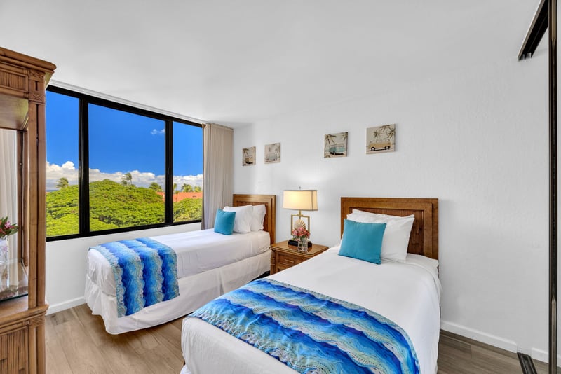 The comfortable twin beds are perfect for children or guests with vibrant coastal energy