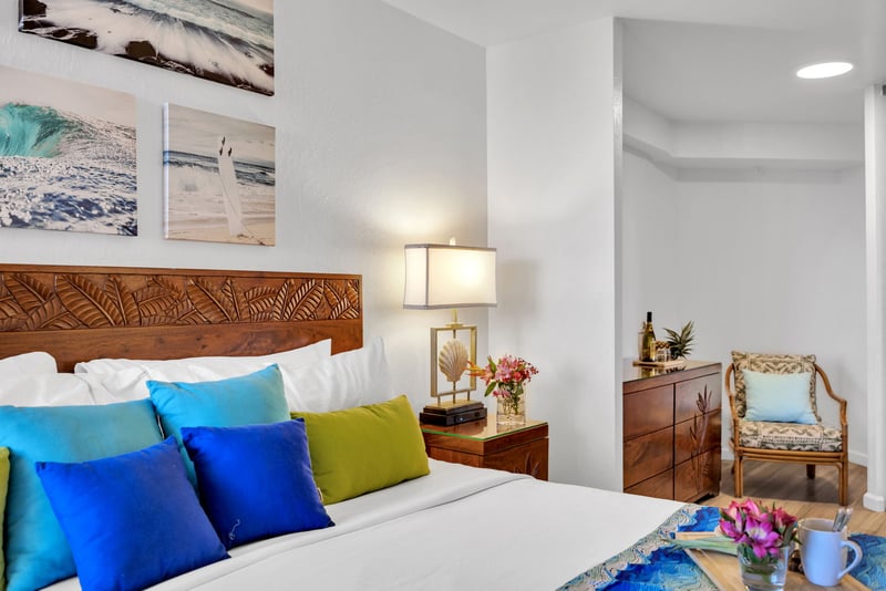 Bold bedding and personal touches offer a cozy escape