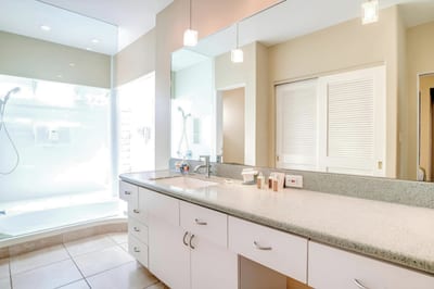 From the stylish cabinetry to the oversized tub, this bathroom balances beauty and functionality perfectly