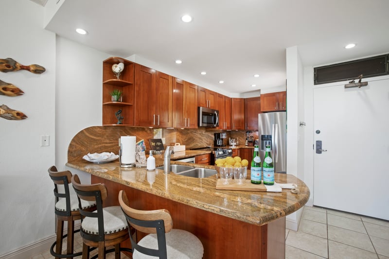 Whip up smoothies, sauté shrimp, or just dance barefoot—this curved-countertop cutie is your culinary playground