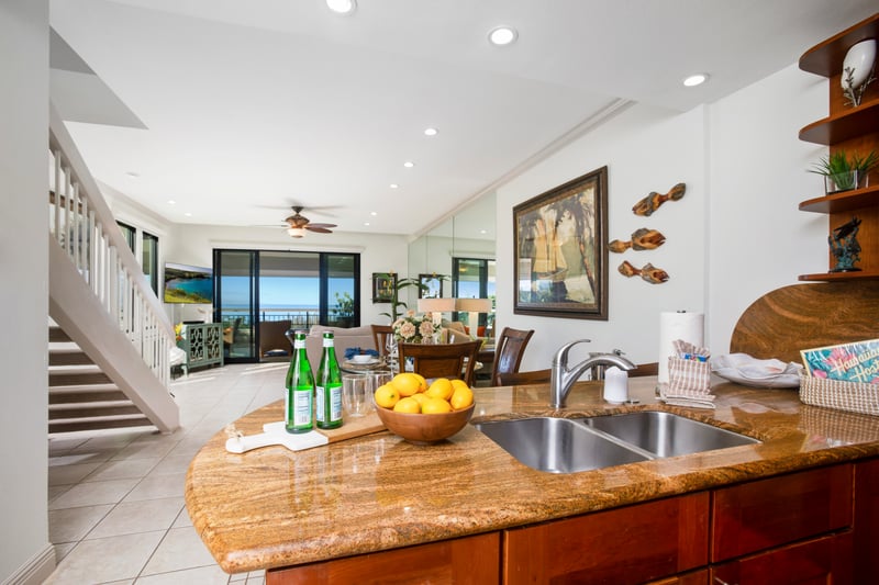 A kitchen where stories simmer with the soup, and stainless steel appliances shine as bright as your island getaway glow