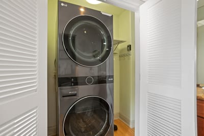 Let nothing hold you back from one more beach dip—your laundry station awaits, discreetly tucked and always ready