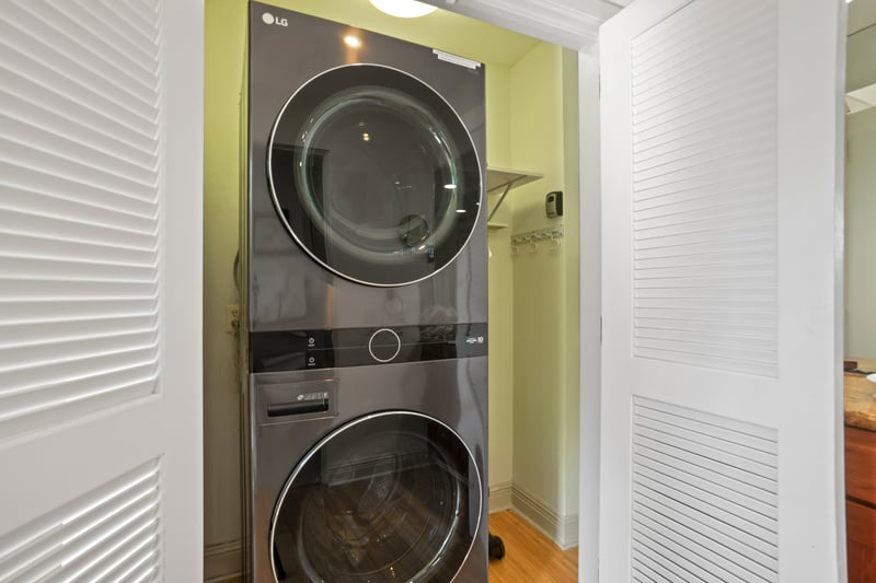Let nothing hold you back from one more beach dip—your laundry station awaits, discreetly tucked and always ready