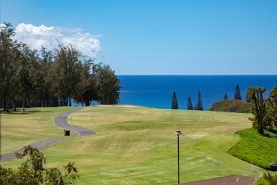 This breathtaking view blends manicured greens and deep ocean blues for a stay that’s peaceful, luxurious, and rare