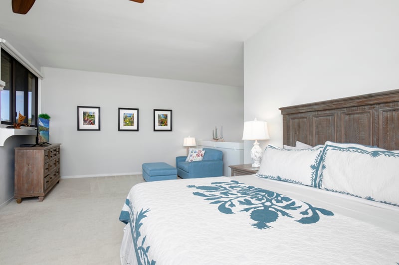 The spacious master bedroom offers a sitting room and ocean views