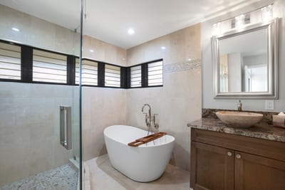 Soak like royalty in your freestanding tub throne, complete with a wooden caddy for bubbles, books, or bubbly