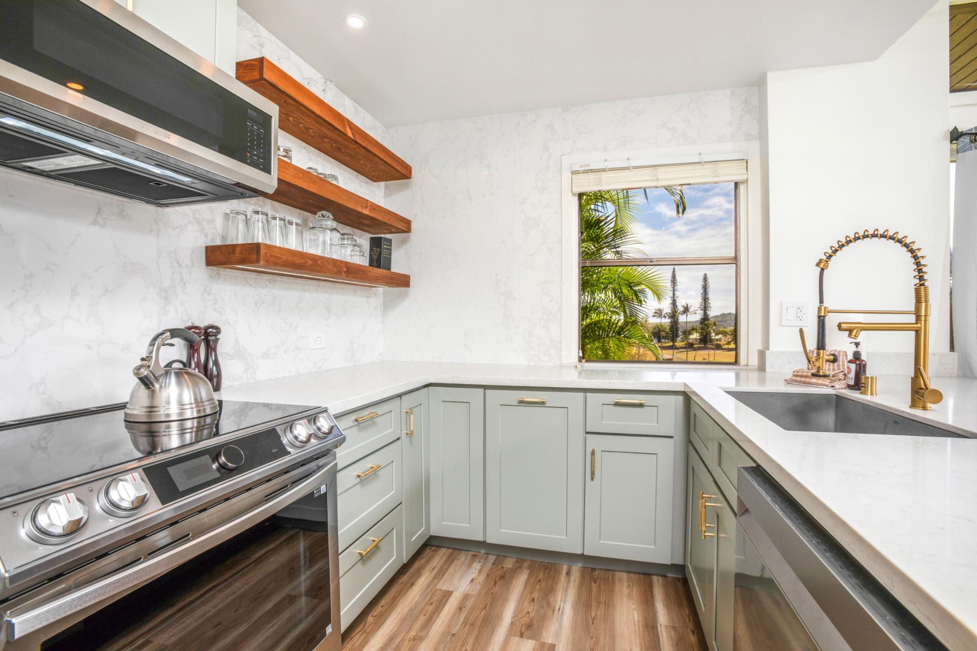 Cooking for your group won't take you away from the action! This gourmet kitchen is perfect in the open-concept living area - with ocean views!