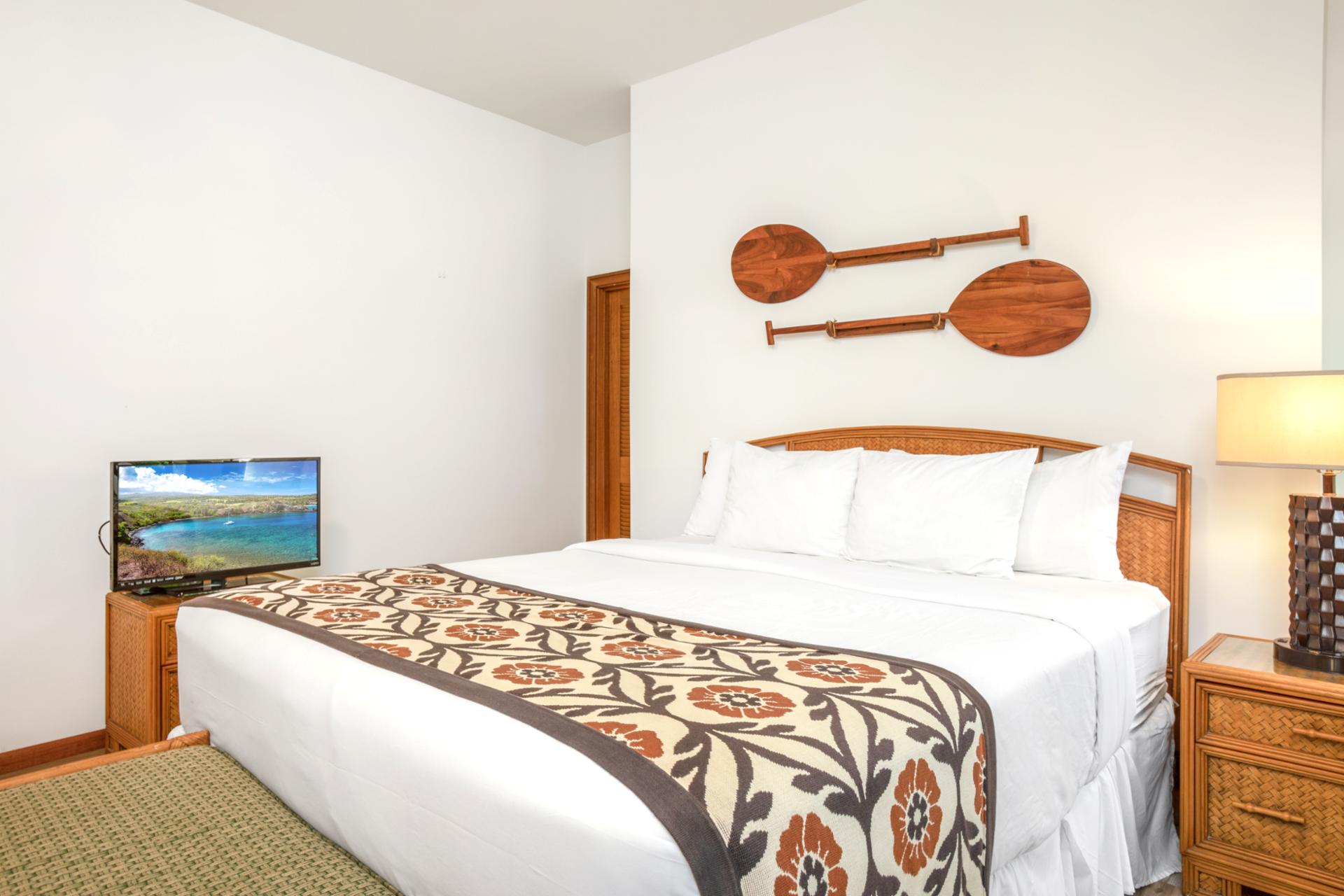 Bold patterns, crisp linens, and tropical charm create a serene escape designed for deep rest