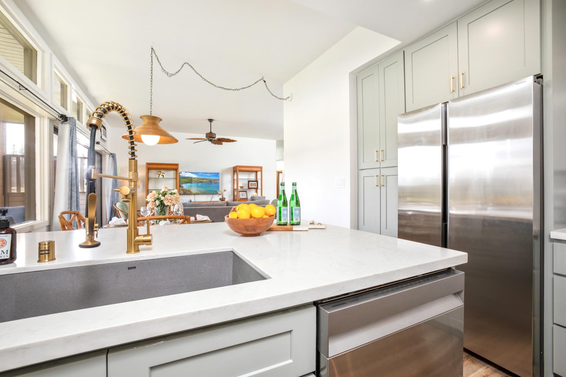 Modern kitchen with stainless steel fridge and deep farmhouse sink