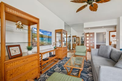 Spacious living area with large windows and coastal-inspired decor KRV-514