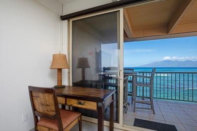 This serene writing nook pairs handcrafted island charm with an inspiring view—where thoughts drift as easily as the waves beyond