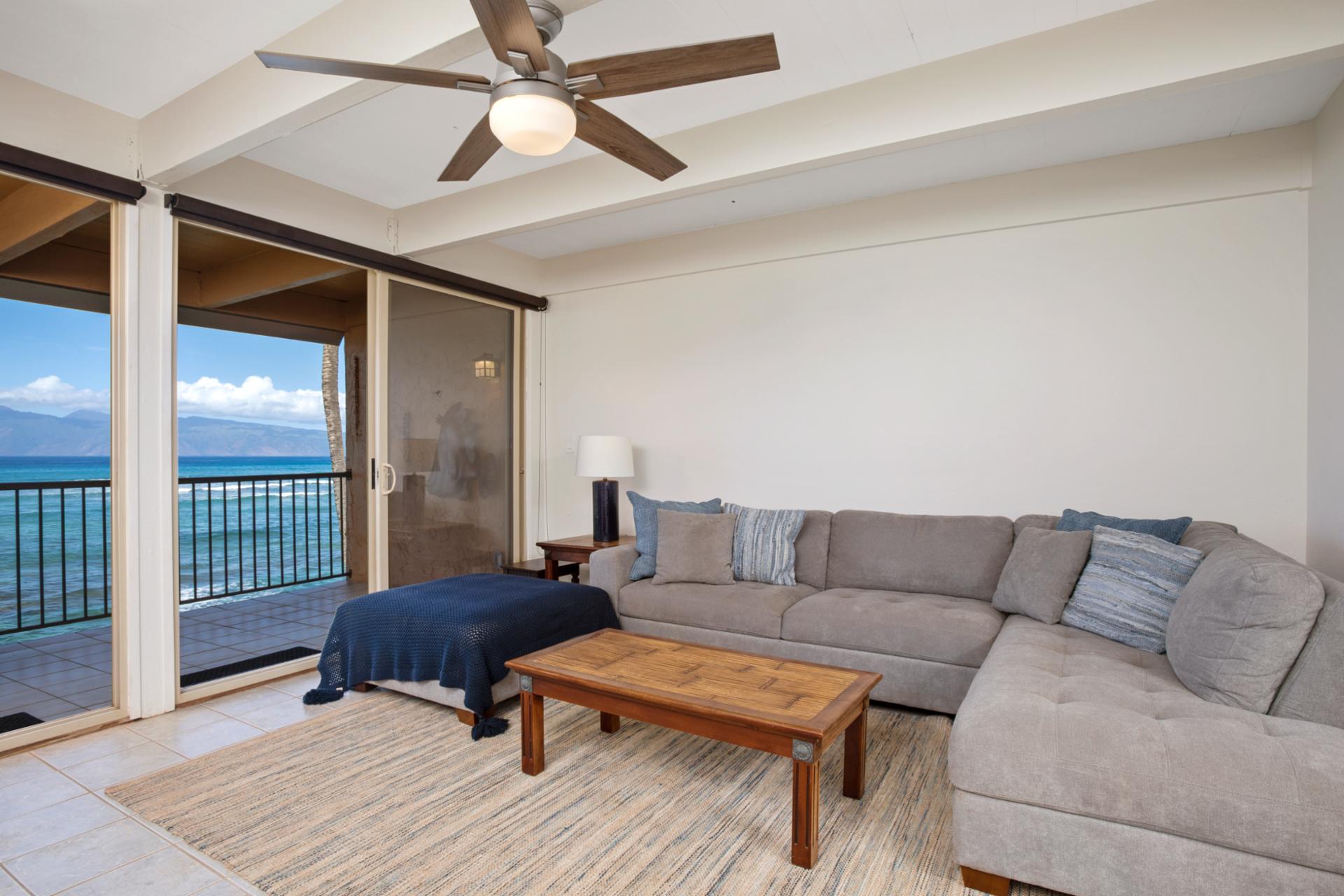 Slide open the lanai doors and let the rhythm of the waves and breeze fill this serene, coastal-inspired space   