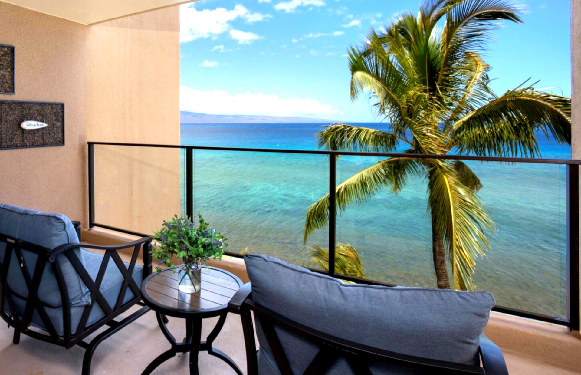 This oceanfront lanai offers front-row views of swaying palms, turquoise waters, and the sound of pure serenity 