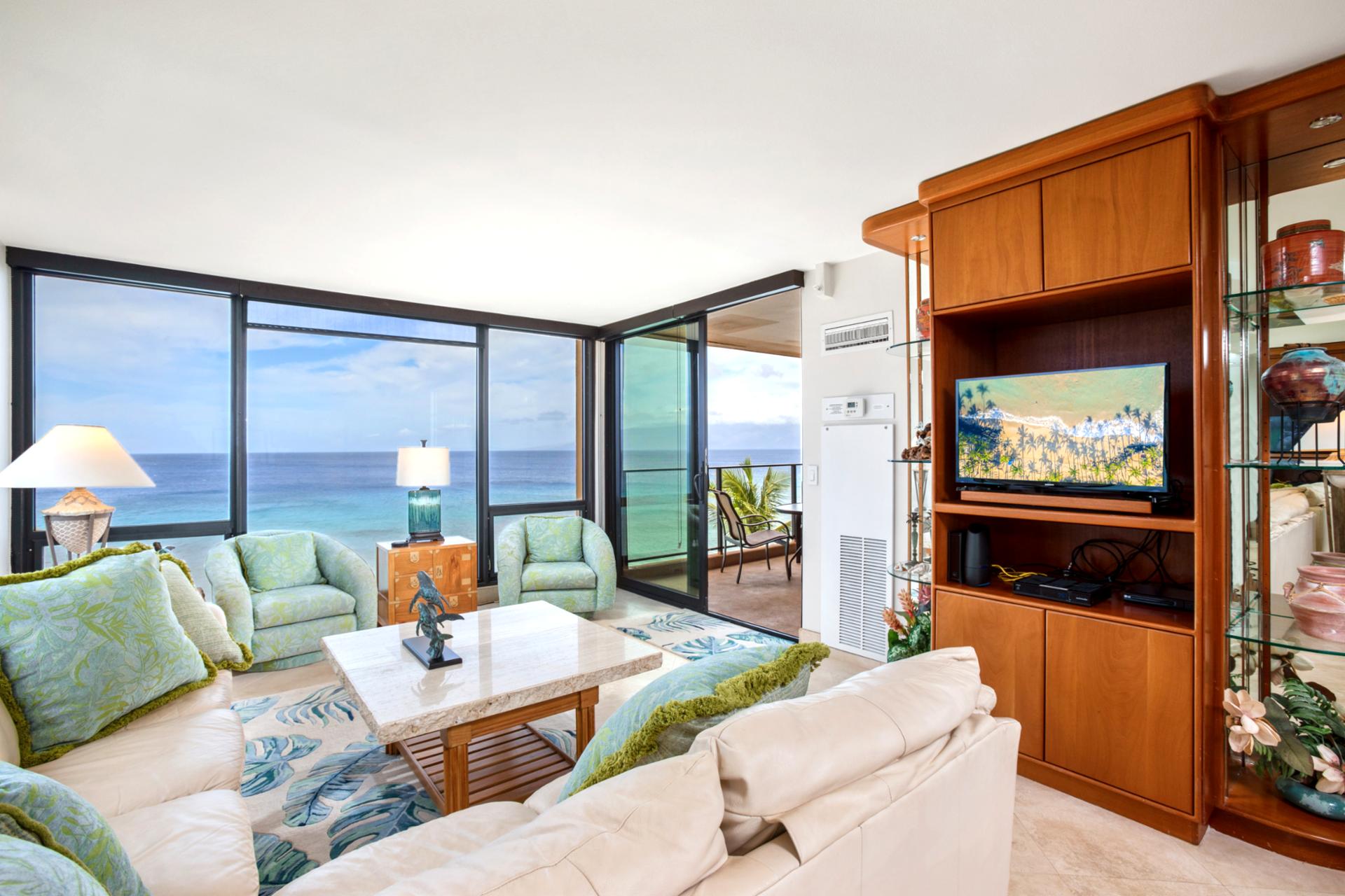 Relax in a spacious living room framed by sweeping ocean panoramas