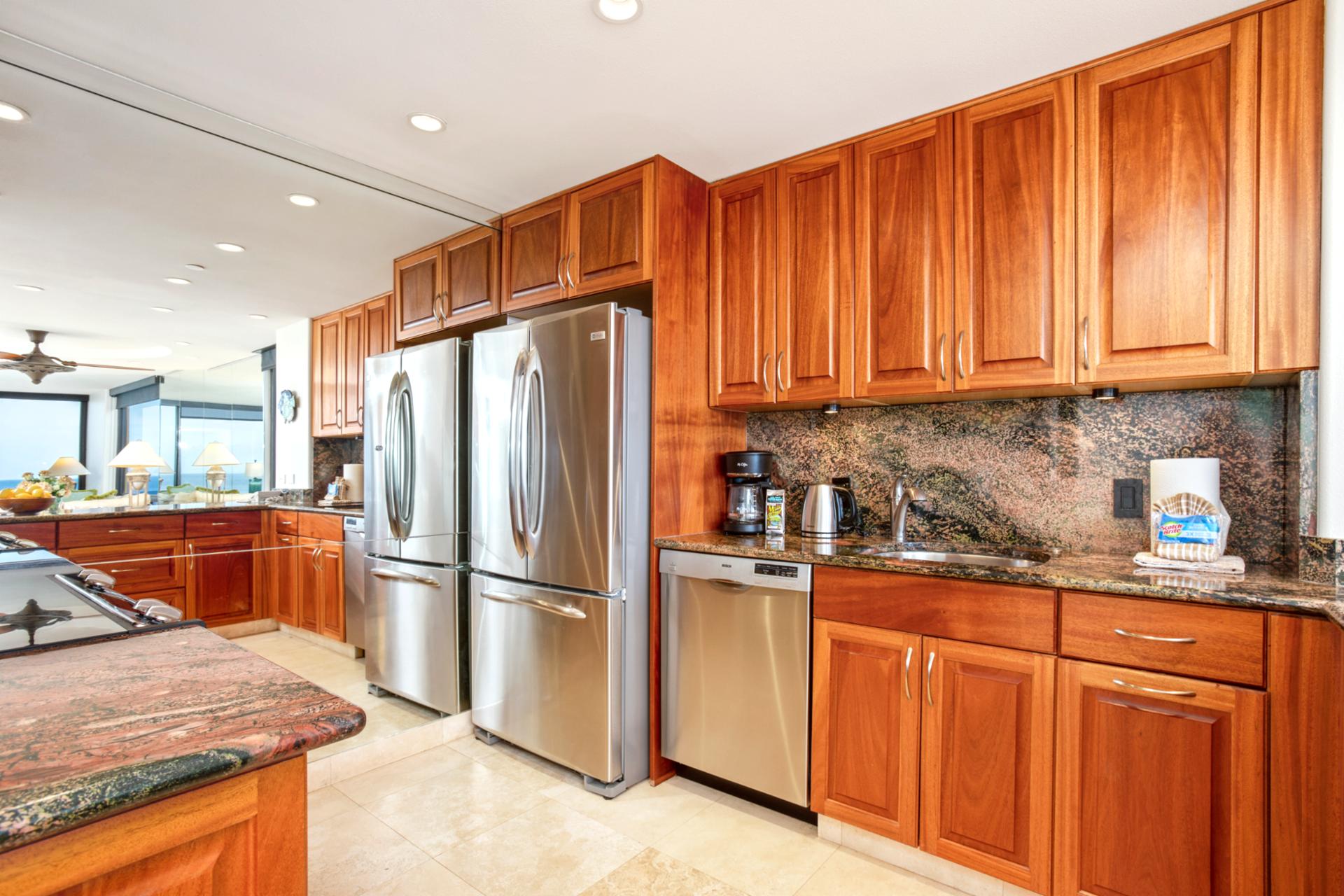 Sleek and modern with stainless steel appliances - perfect for family meals