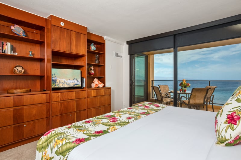 Unwind in a warm, wood-accented master suite with soothing island tones MAH-719