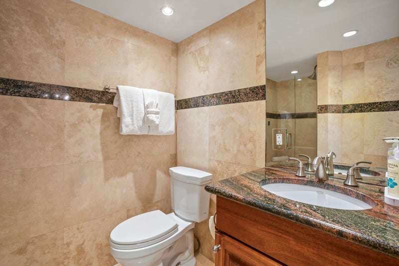 The master bath features a separate shower and toilet area for additional privacy MAH-719