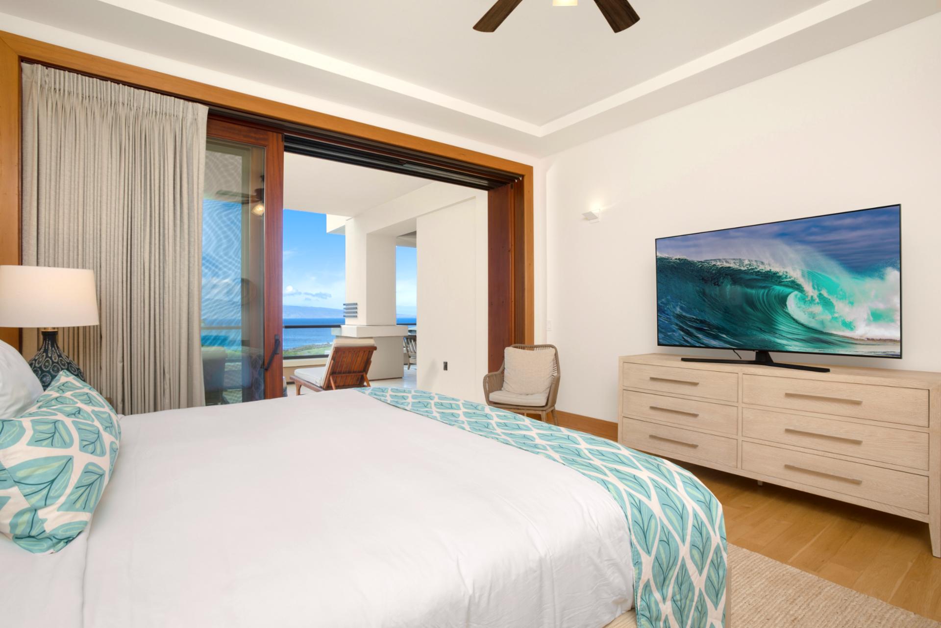 Natural wood tones and ocean-inspired textures create a refined atmosphere grounded in calm sophistication