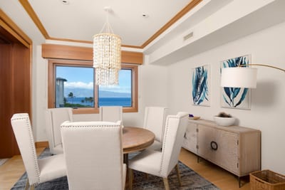 Seashell chandelier sparkles above, while the view beyond the window sings lullabies only the ocean knows MON-6301