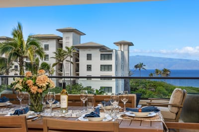 Dine beneath open skies where soft ocean blues meet lush palms and modern elegance flows from kitchen to coastline MON-6301