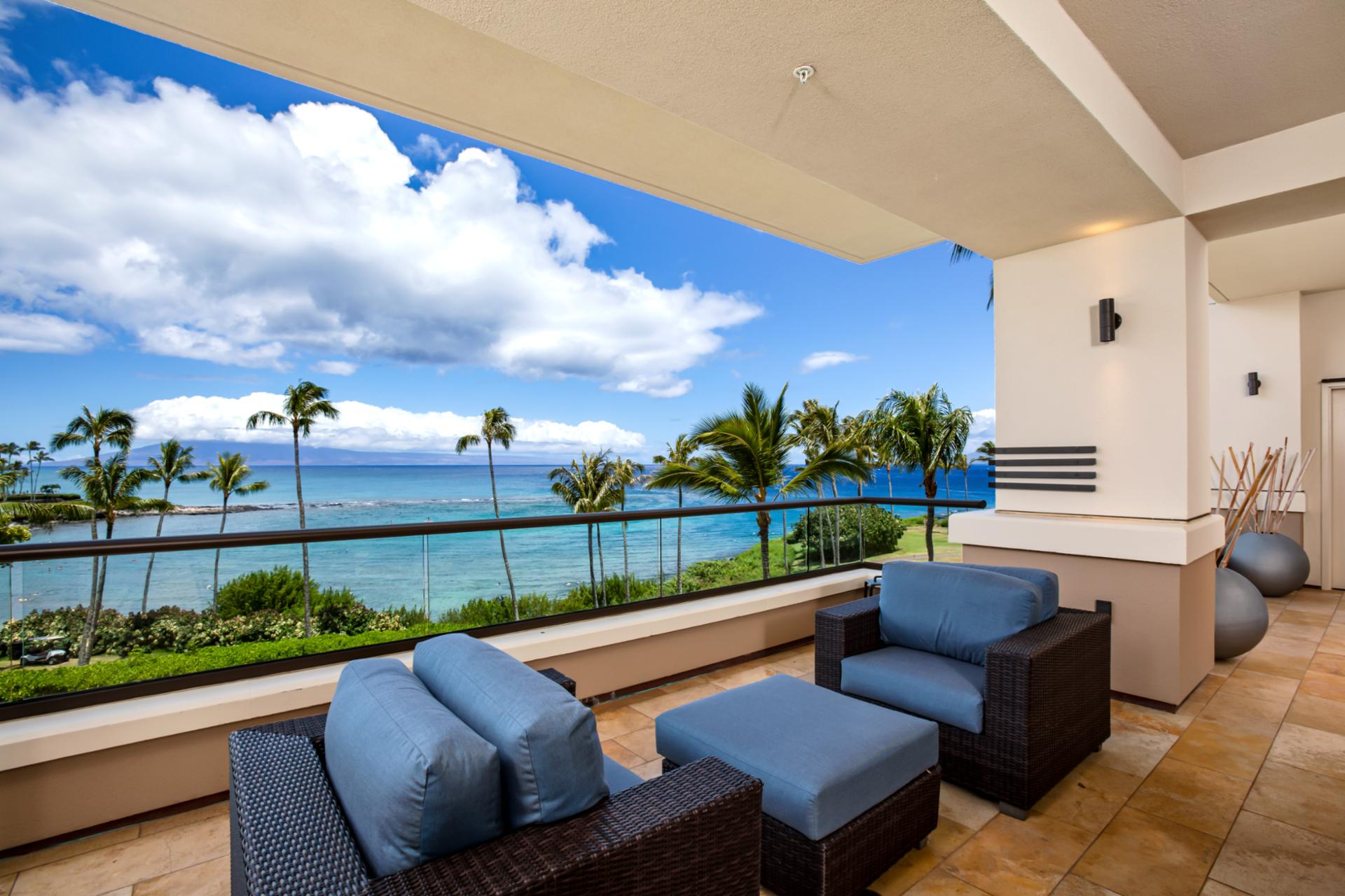 Lounge outdoors with panoramic ocean views and gentle Hawaiian breezes