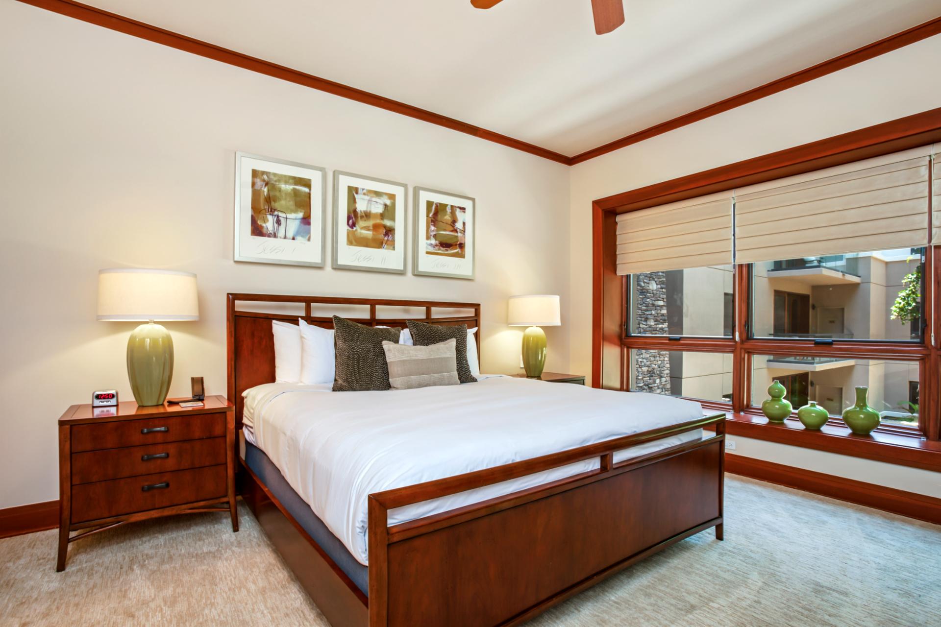 Comfortable and clean, this guest bedroom offers restful nights and morning light