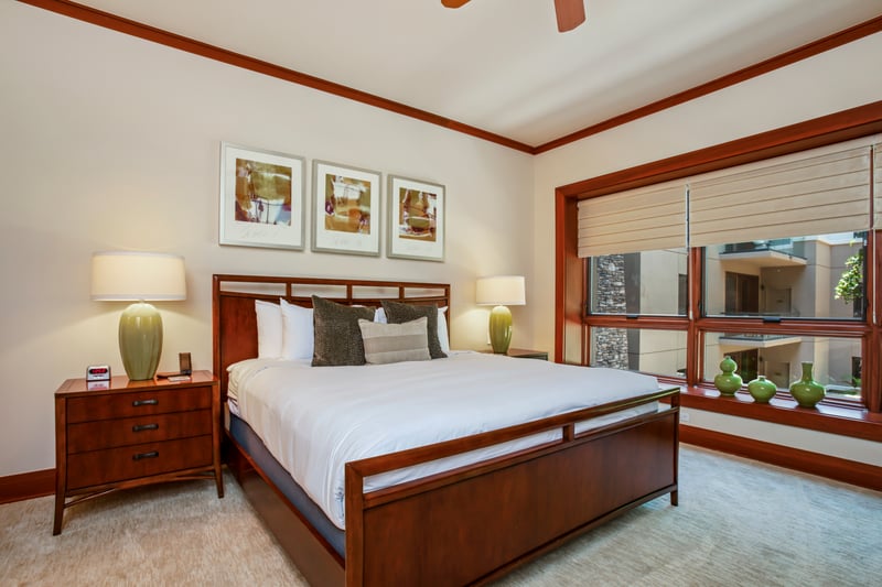 Comfortable and clean, this guest bedroom offers restful nights and morning light MON-1303