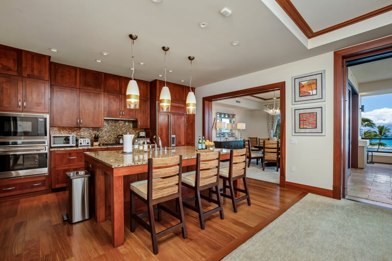 Fully equipped gourmet kitchen opens to the dining area for easy entertaining MON-1303