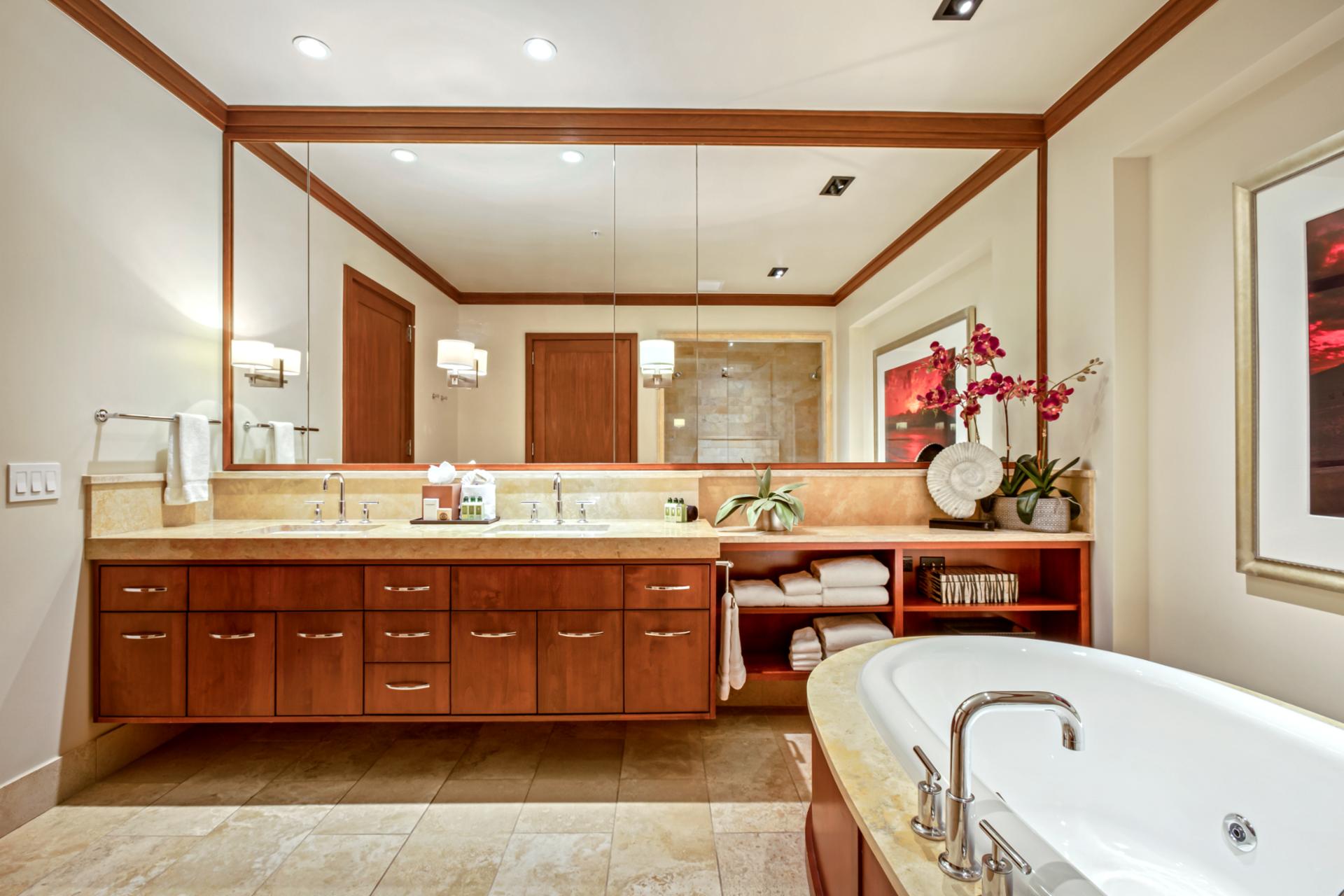 Elegant and tranquil, this master bath features a serene soaking space
