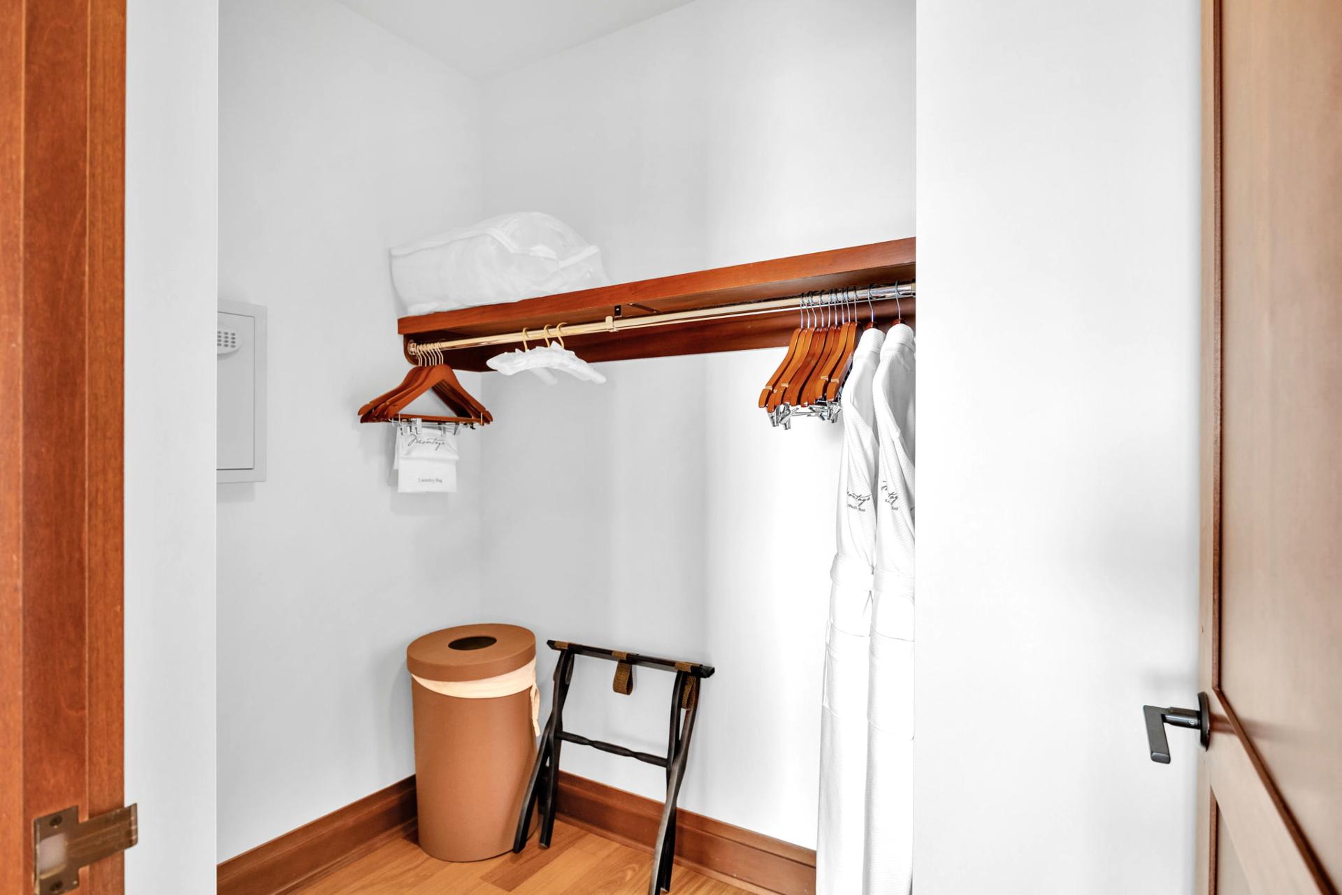 Ample guest closet with shelving and thoughtful storage space

