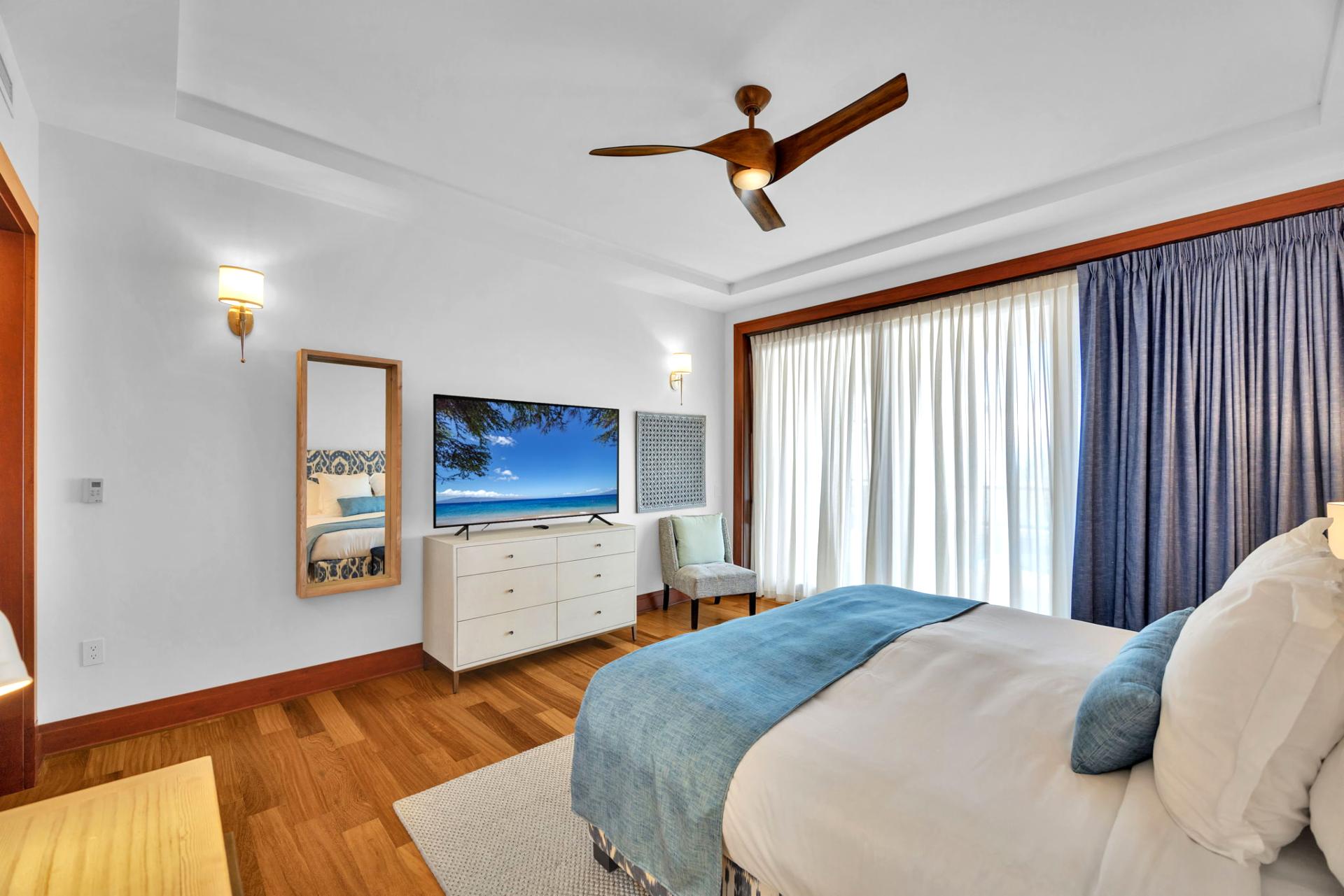 Spacious master suite with soft tones and coastal decor for restful nights