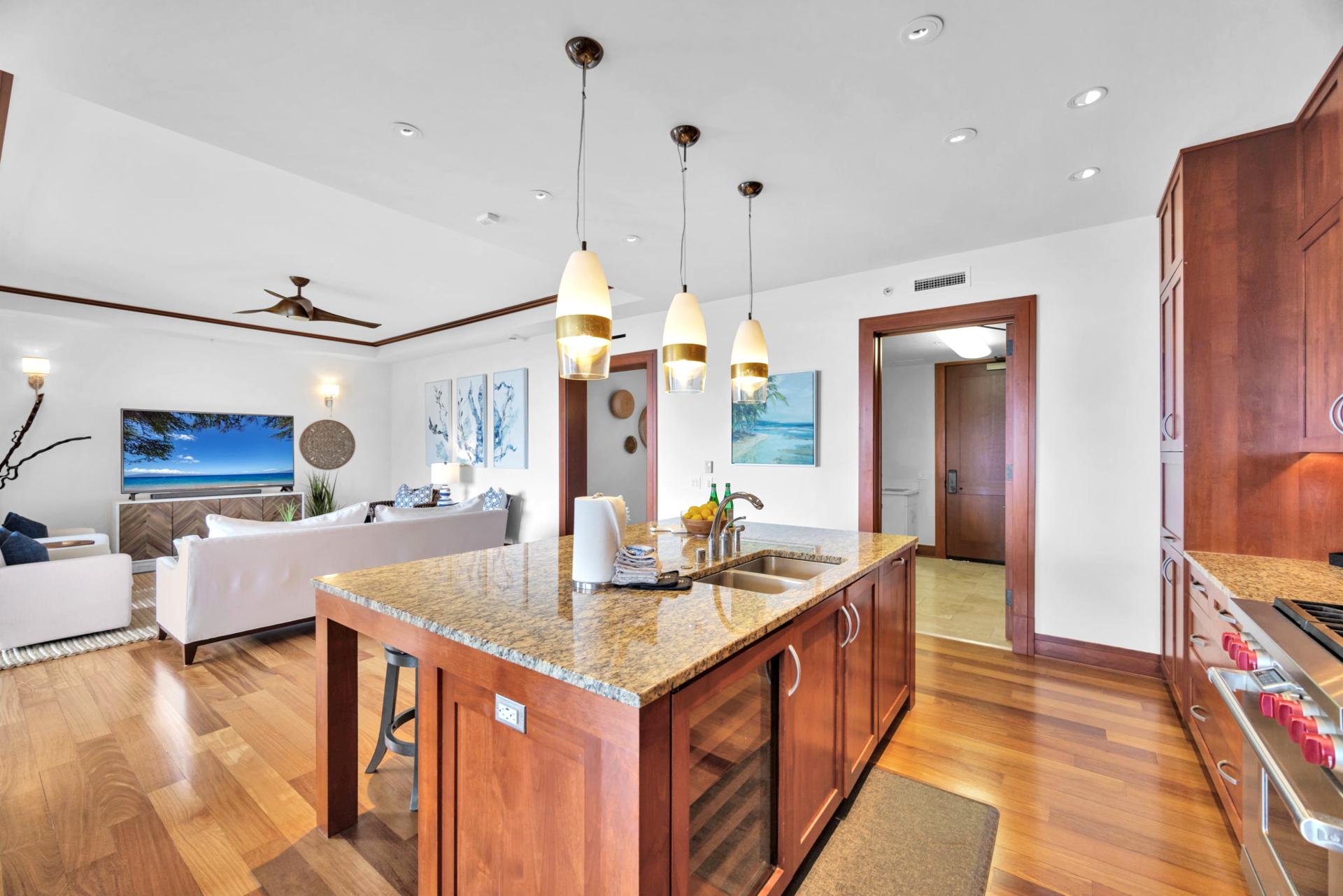 Enjoy a fully equipped kitchen opening into a bright living space 