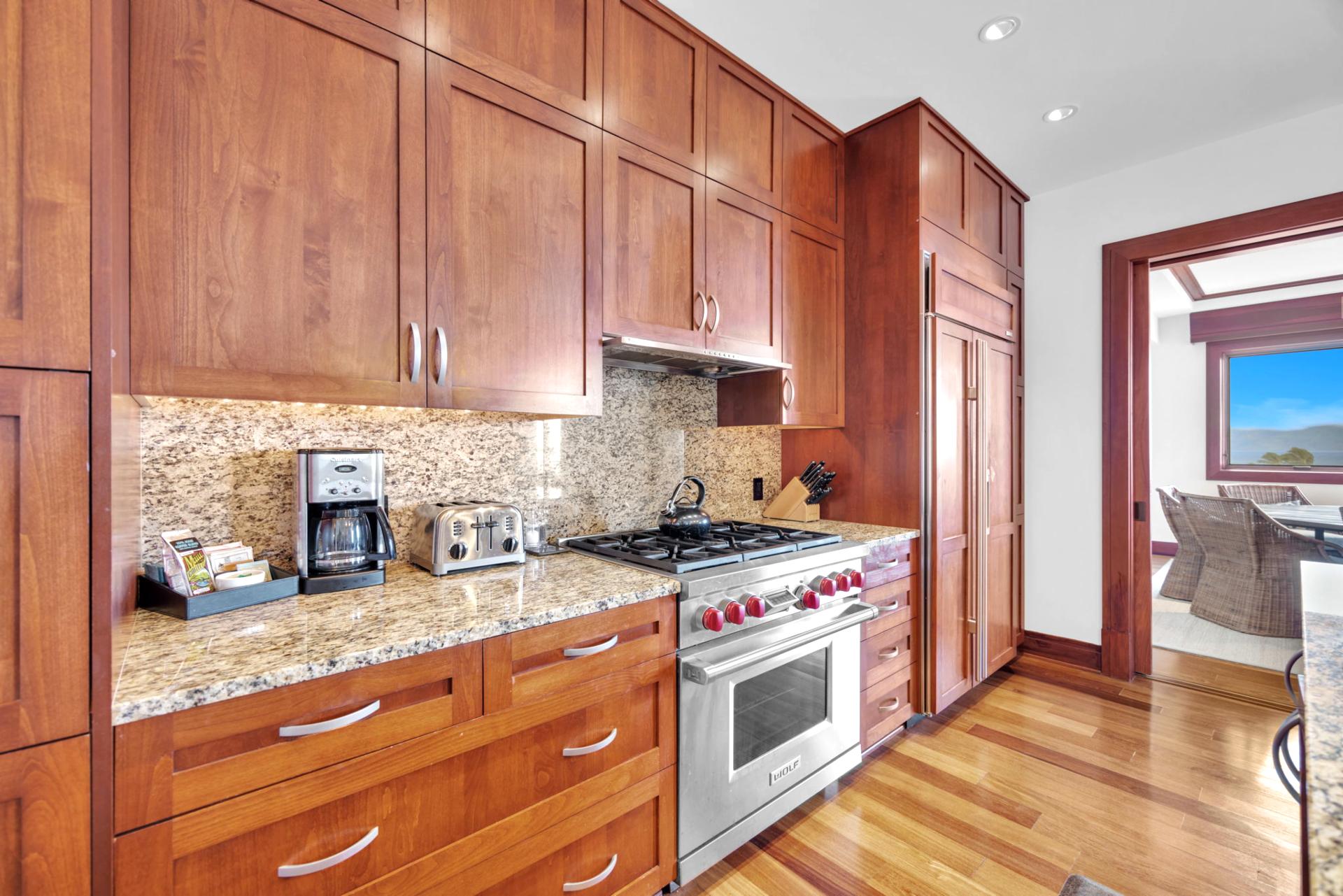 Kitchen with granite counters and high-end appliances for chef-style cooking