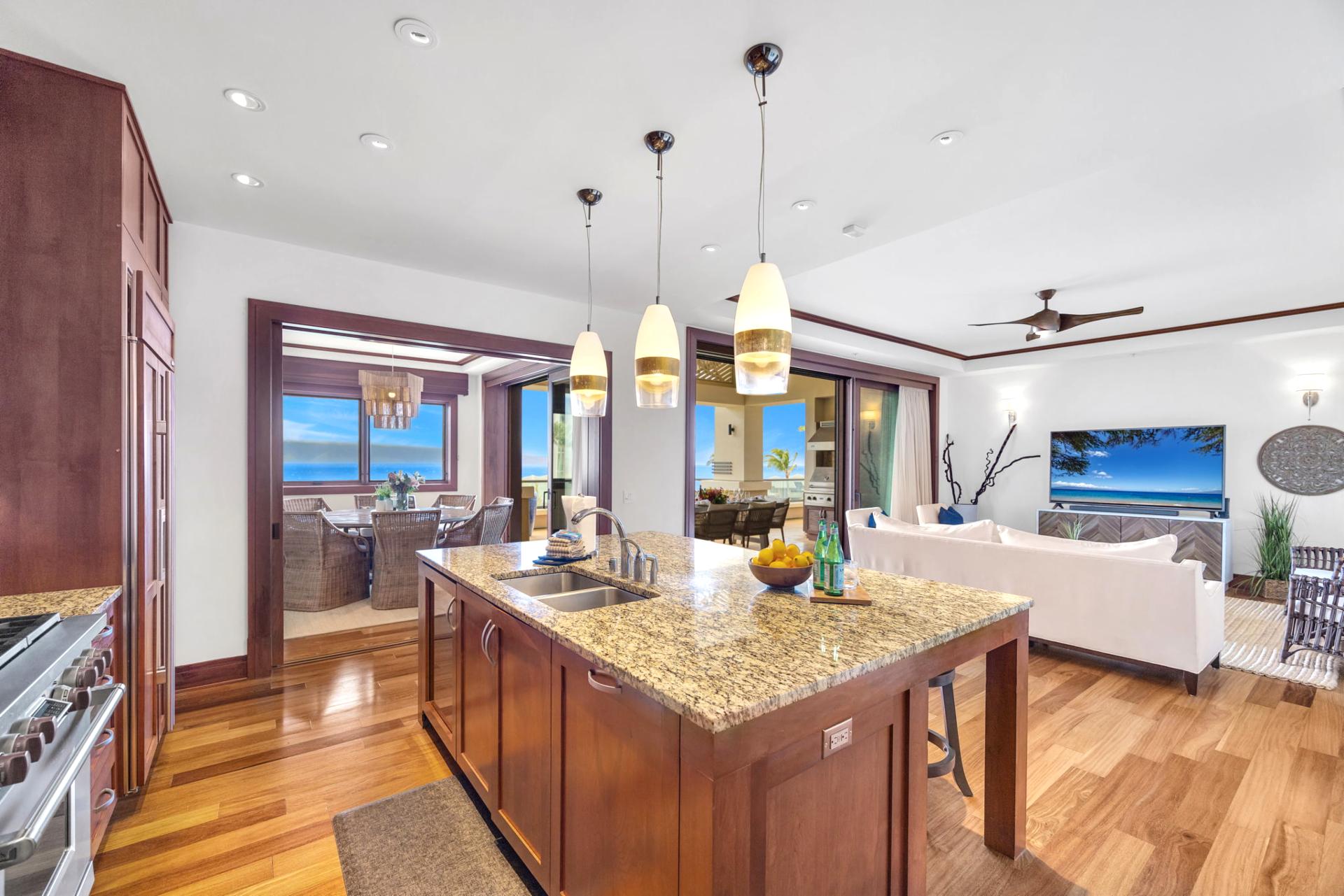 Gourmet kitchen with island seating and full ocean view to inspire every meal

