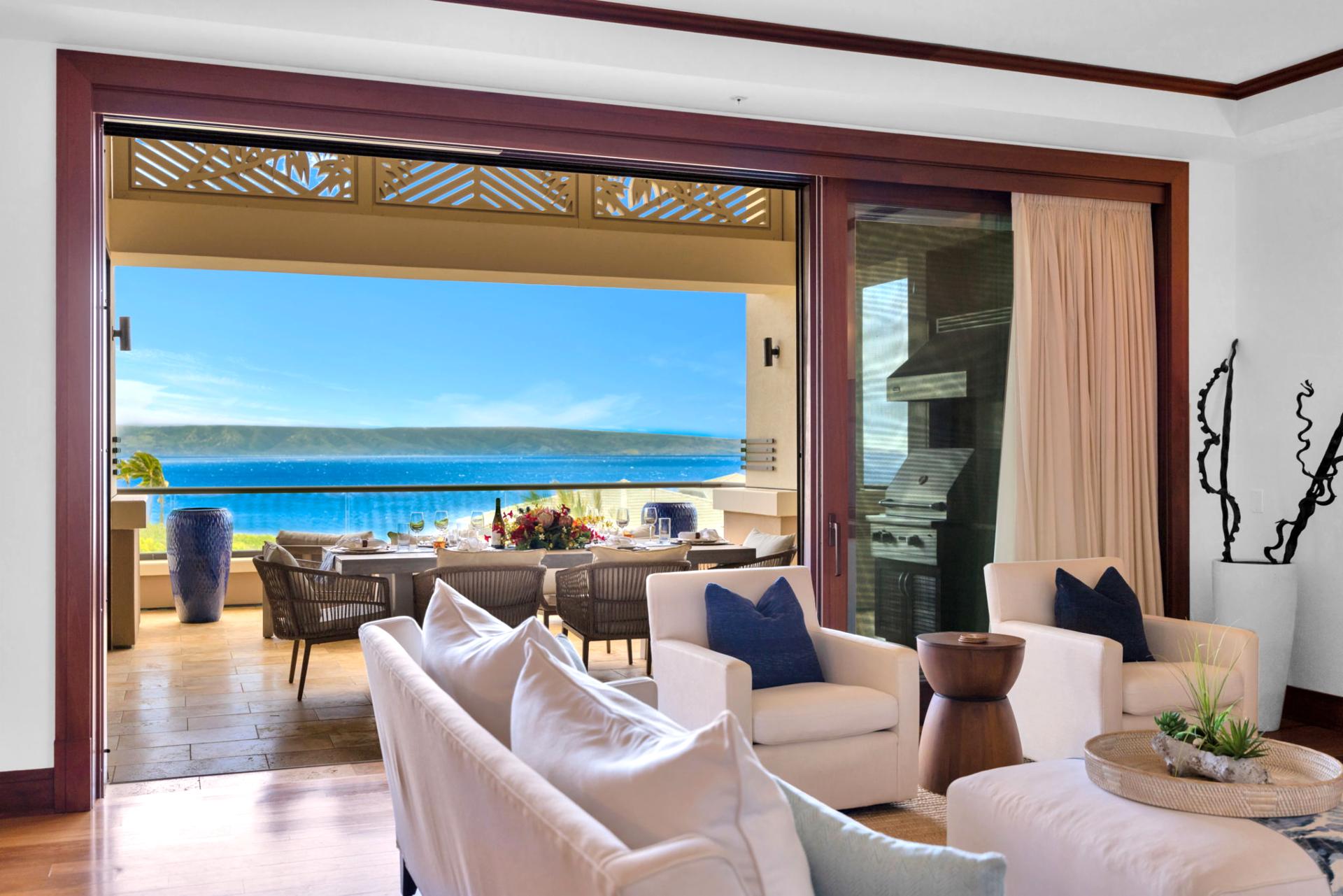 Elegant living room with retractable doors for seamless indoor-outdoor flow