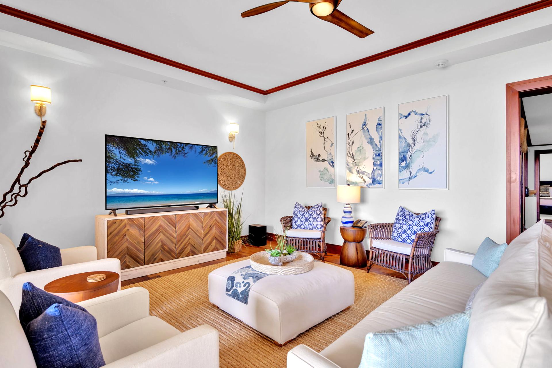 Cozy up with loved ones in this inviting lounge with coastal character