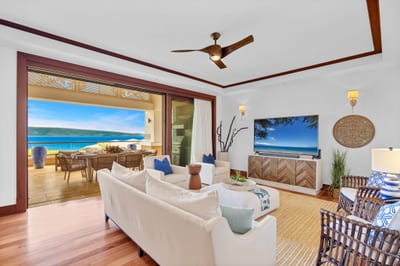 Bright living area with cozy seating and ocean outlook