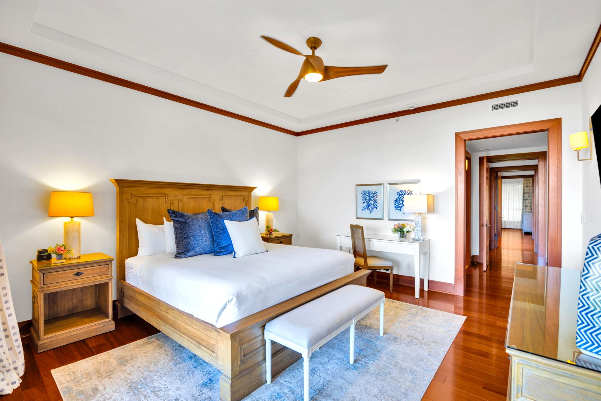 The master bed features a comfortable king size bed and private workspace