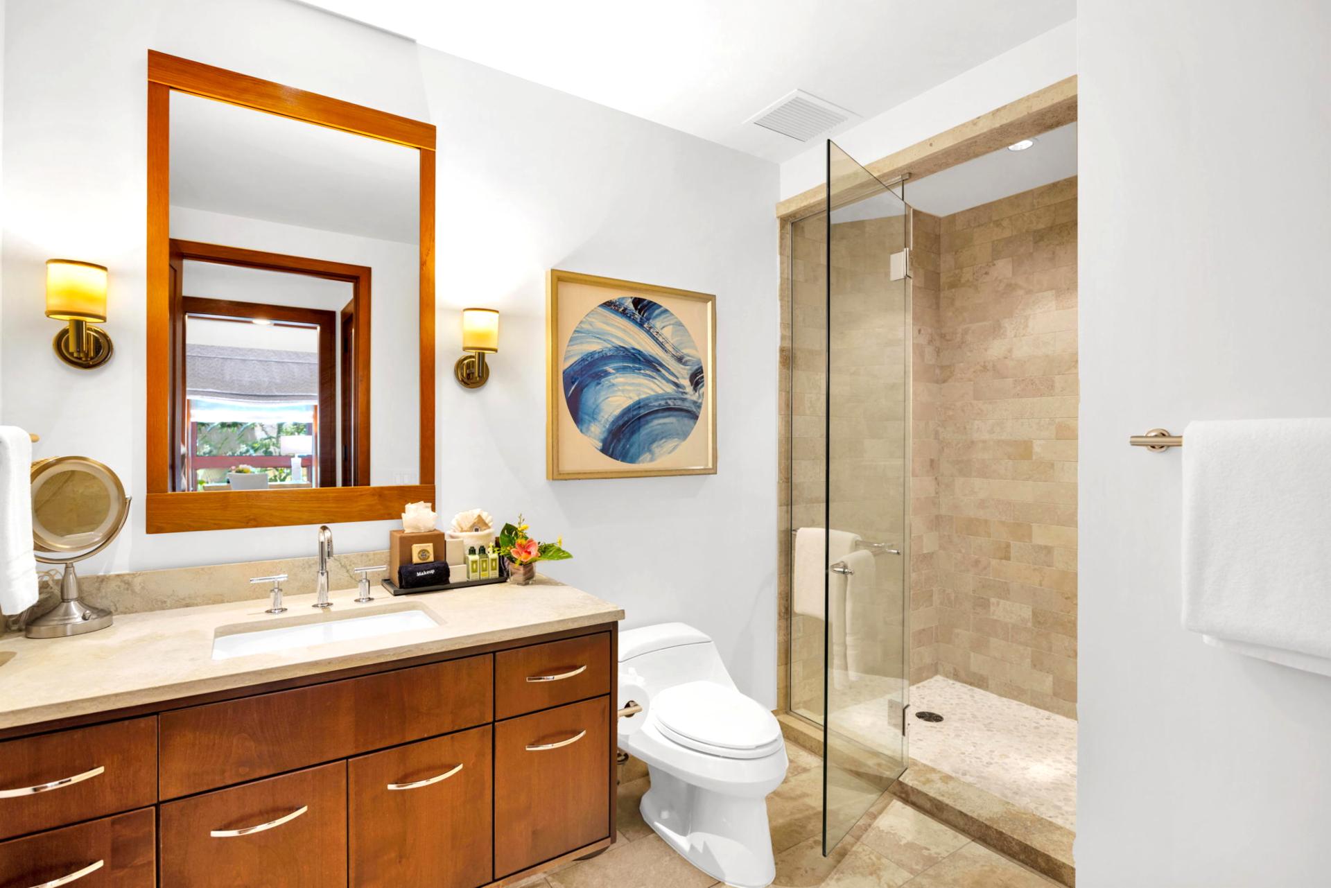 Glass-enclosed shower with elegant tile work