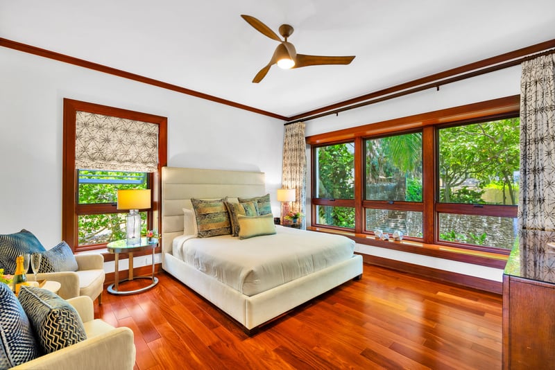 Guest bedroom with natural light and garden views