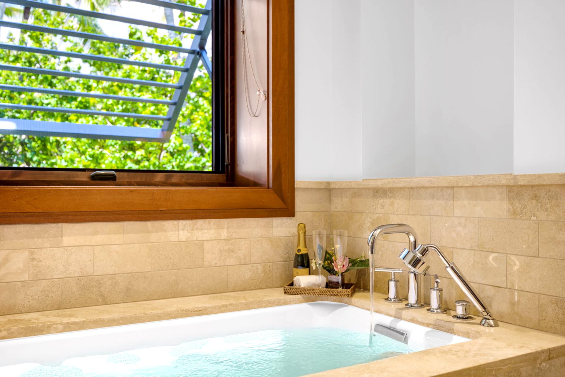 Relax in the bath after playing golf or exploring Maui's waterfalls
