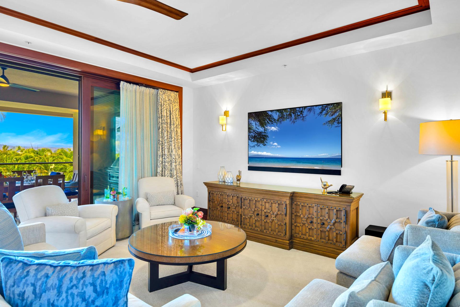 The spacious living area features plush furnishings, perfect for unwinding 