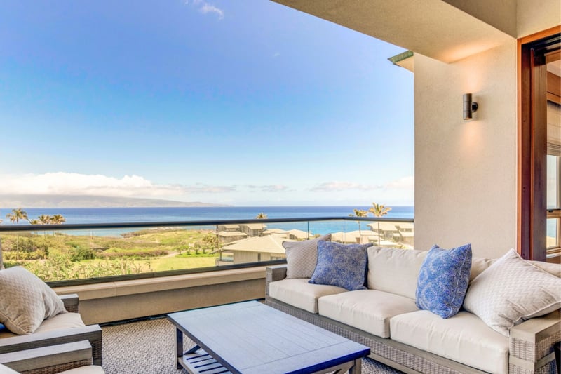 Sink into plush cushions as golden light spills across the horizon and the sea stretches endlessly into the sky’s embrace