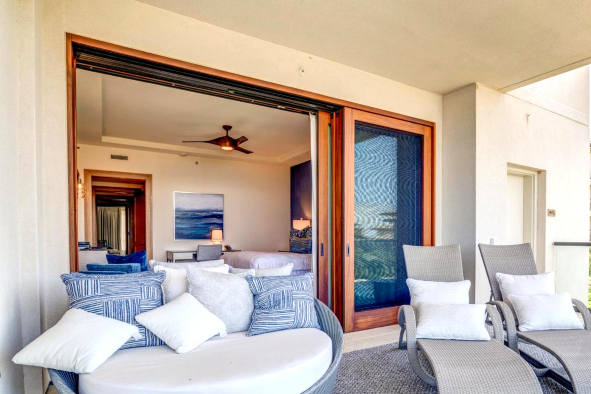 Lounge chairs on the lanai invite lazy mornings or sunset toasts with an uninterrupted view of the horizon