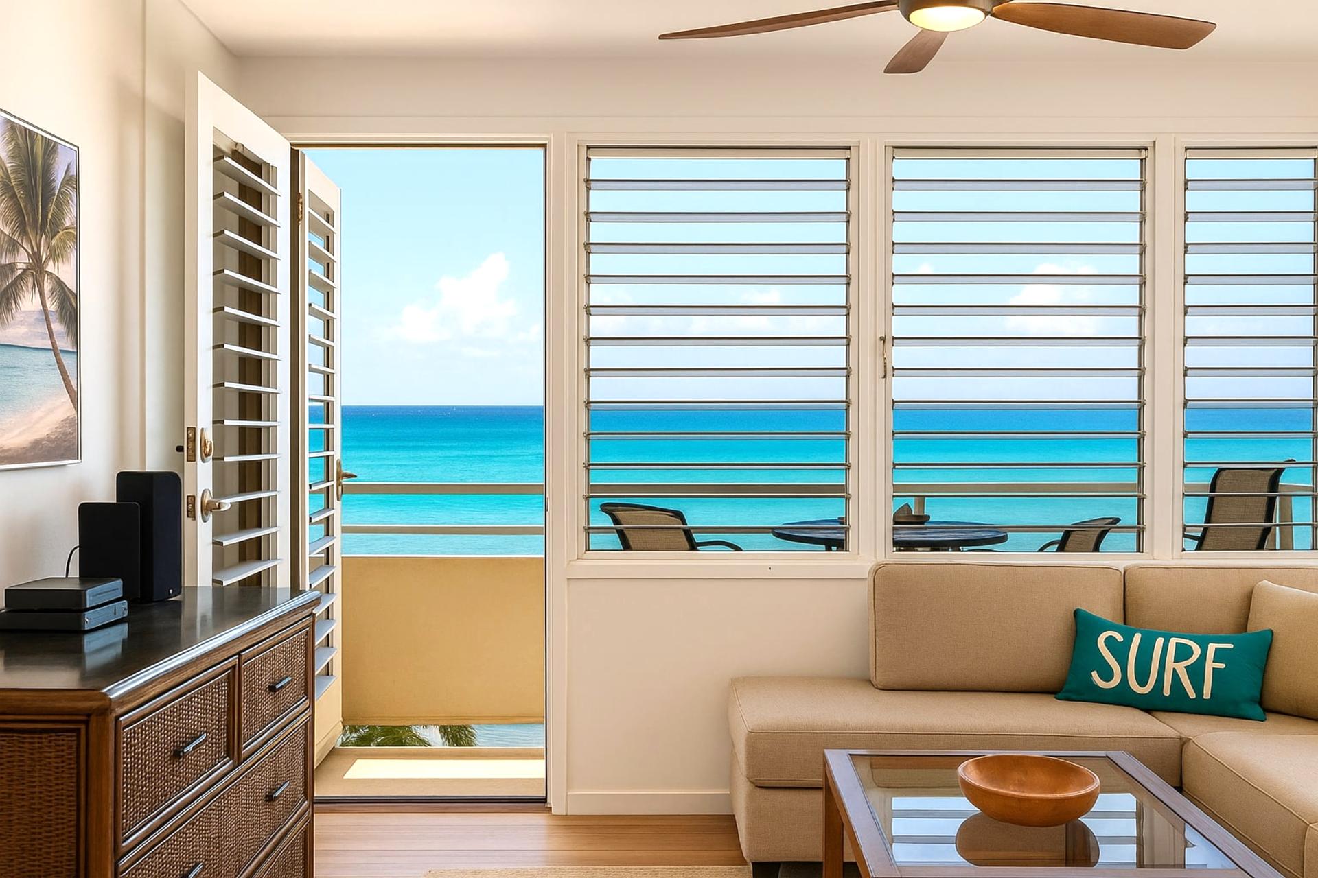 Where sea meets sky, unwind on a cozy sofa with a “surf” state of mind and a view that’s pure tropical magic