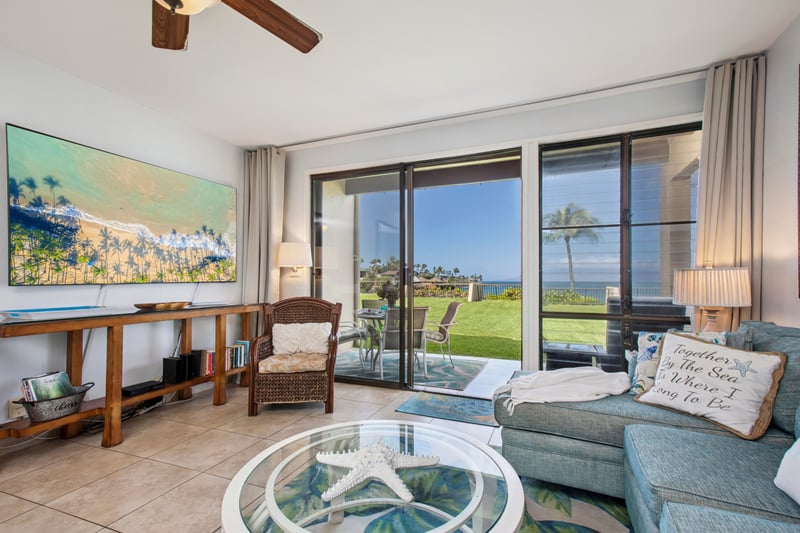 Inviting living area with coastal decor and natural light NAP-B13